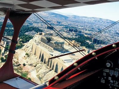 If you can’t visit Greece, bring Greece to you. With the latest version of  Microsoft Flight Simulator, the Acropolis is one of many photorealistic marvels you can visit from the comfort of your home—while flying a simulated Pitts Special biplane.