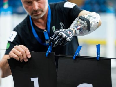 A man with a mind-controlled prosthetic competes in a test run of October's Cybathlon in Switzerland. 