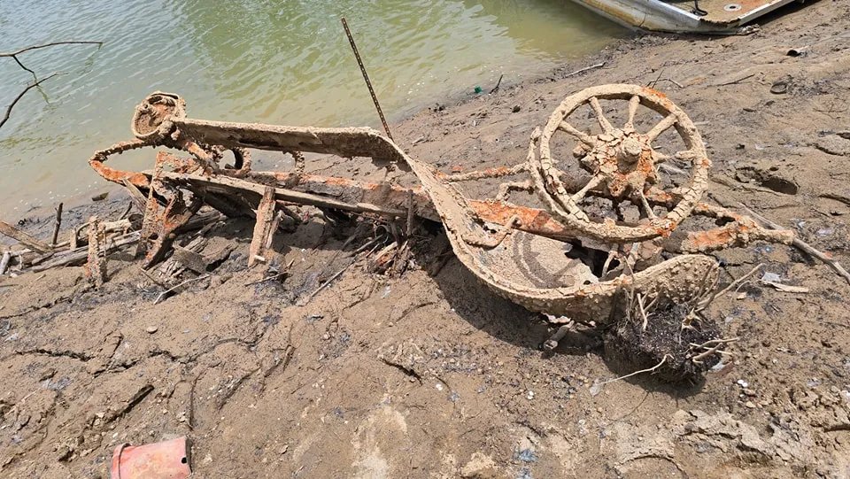 Old vehicle covered in mud
