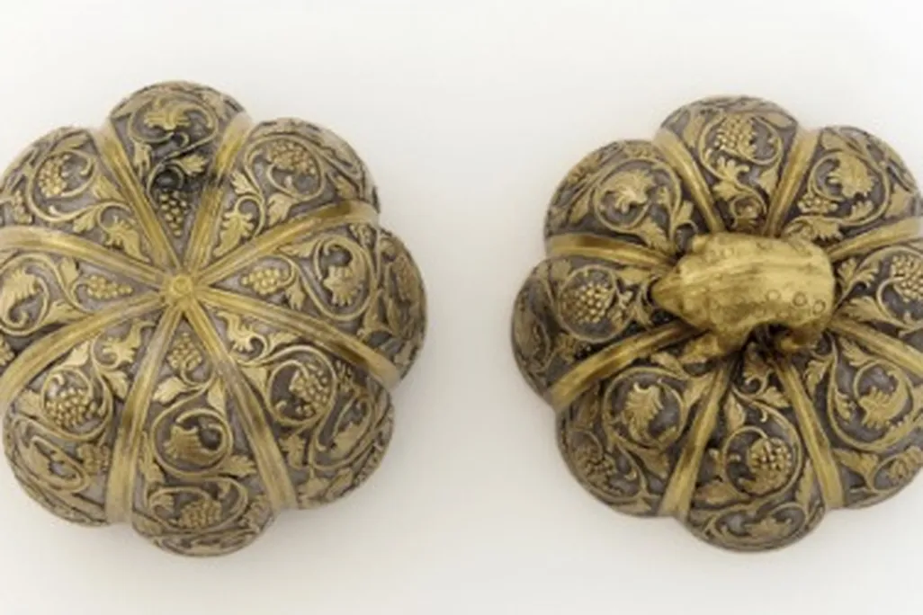 A silver Chinese box in the shape of a flower, Tang Dynasty, late 7th to early 8th century