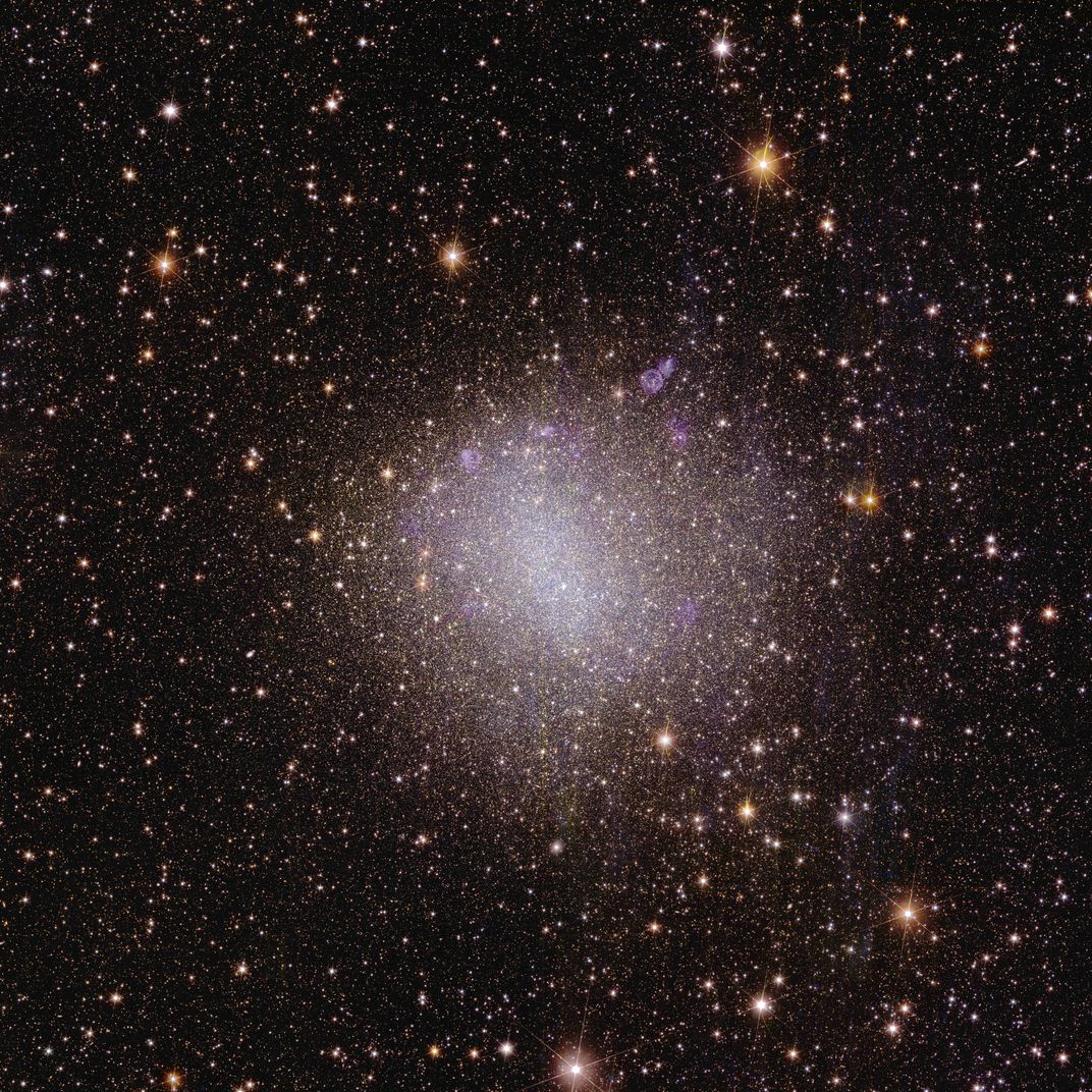 An image of stars making up a small, irregularly shaped galaxy