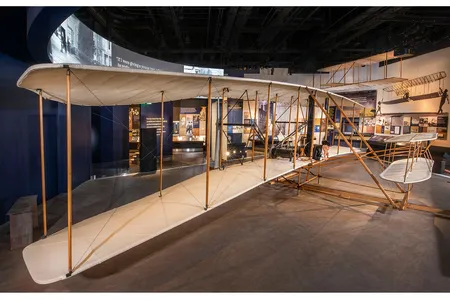 Among the eight exhibitions opening October 14, 2022, is &quot;The Wright Brothers &amp; The Invention of the Aerial Age,&quot; featuring the museum&#39;s iconic 1903 Wright Flyer.