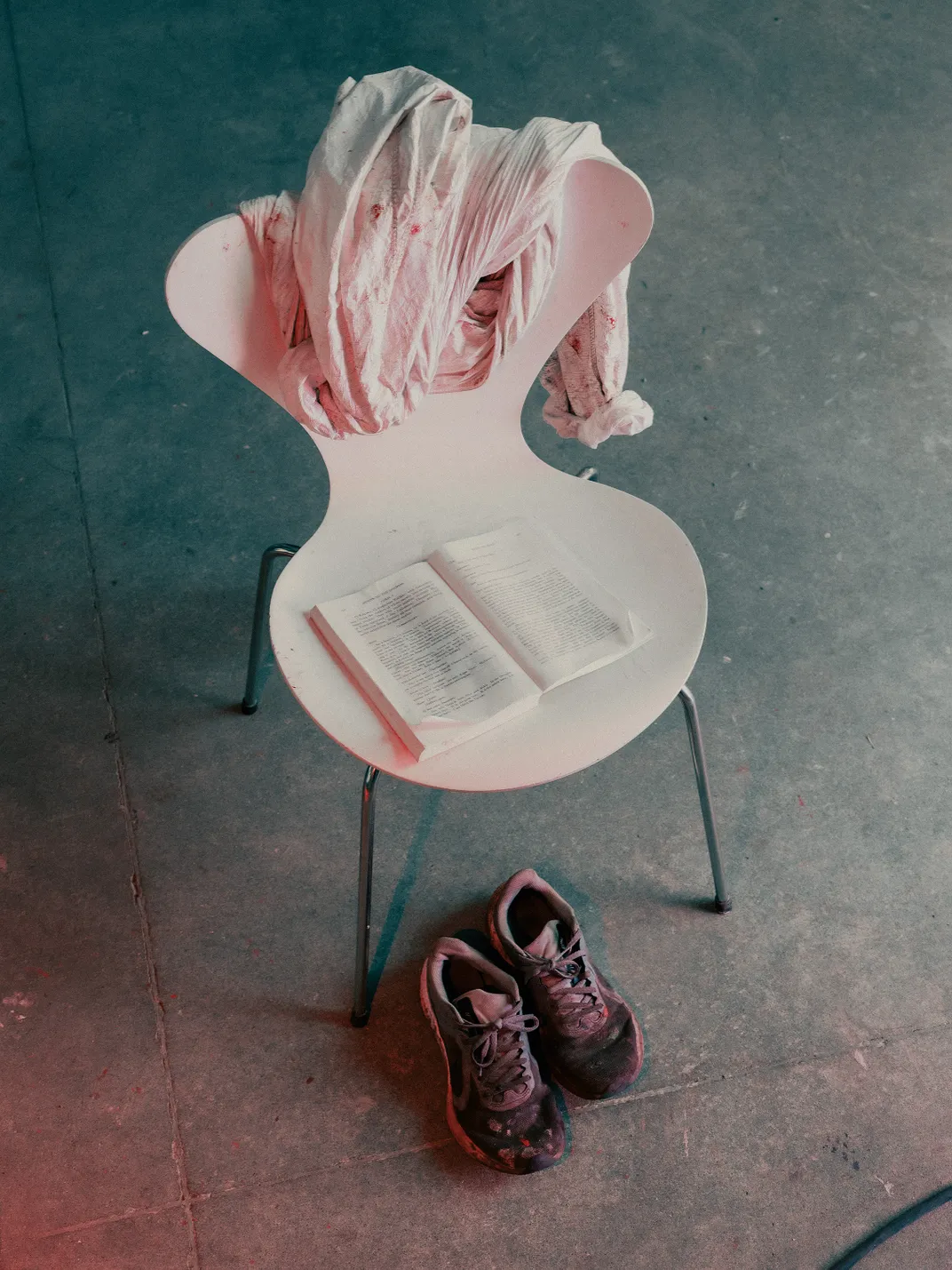 A smock, shoes and book of Hindu hymns accompany a mid-century modern chair in Kapoor’s studio, “a place of experimentation, mostly of failure,” he says.