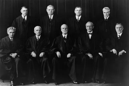 The members of the Supreme Court including Chief Justice Charles Evans Hughes (center, front row) ruled against President Franklin Delano Roosevelt's New Deal programs.