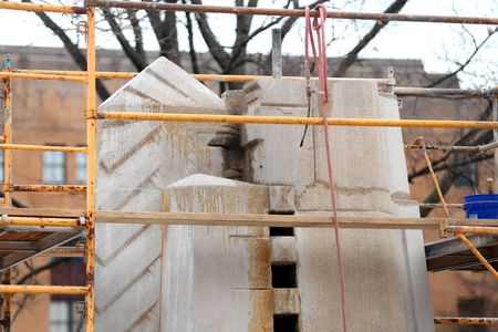 Contracted crews remove the Fountain of the Pioneers complex from Bronson Park, Tuesday, April 24, 2018.
