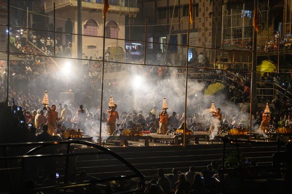 Hindu ceremony at night on the Ganges River in Varanasi, India thumbnail