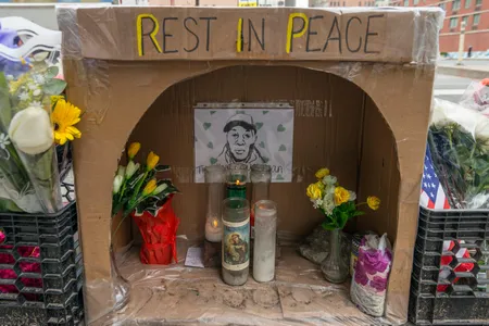 A makeshift shrine to Timothy Caughman, a black 66-year-old man who was fatally stabbed by James Harris Jackson, a white 28-year-old who reportedly traveled to New York with the intention of killing black men, on March 20th, 2017. The memorial was seen on the sidewalk at the Southeast corner of West 36th Street near to where Caughman resided and was slain. (Photo by Albin Lohr-Jones)
