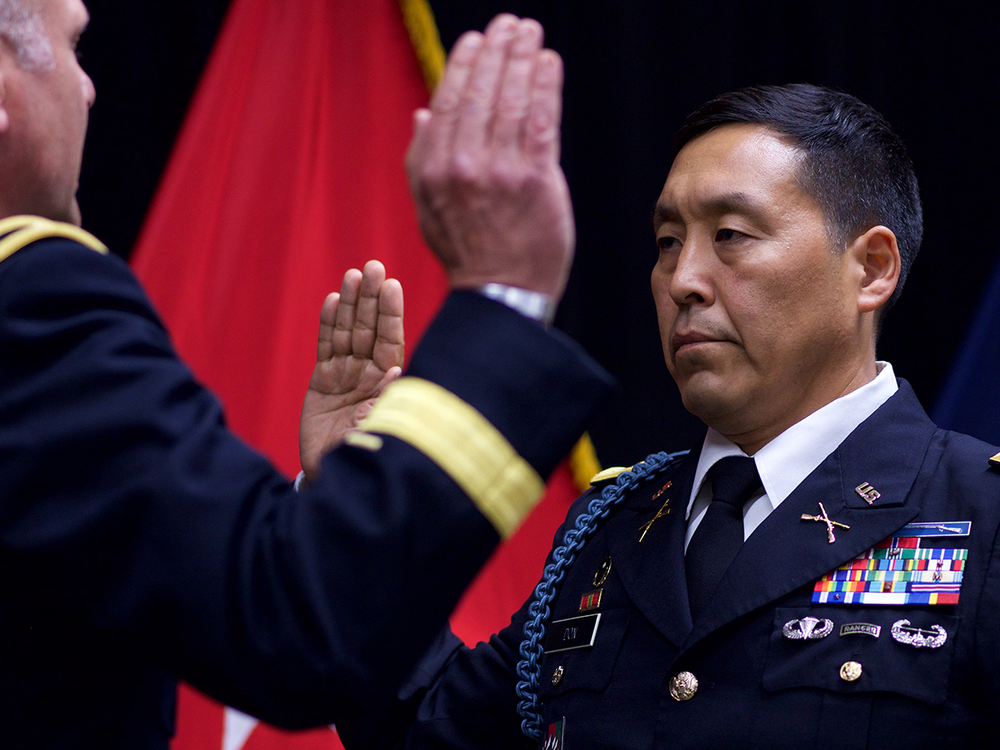 Alaska Army National Guard Col. Wayne Don, then 38th Troop Command commander, pledges the Oath of Office, administered by Alaska Army National Guard Brig. Gen. Joseph Streff, Alaska Army National Guard commander, after Don was promoted to full colonel. Dena'ina Center, Anchorage, July 14, 2017. (U.S. Army photo by Sgt. David Bedard)
