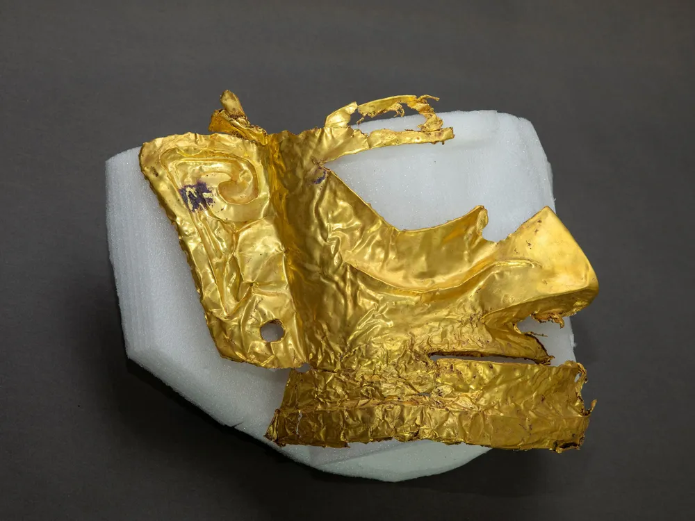 Fragment of a gold mask unearthed at Sanxingdui, an archaeological site in southwestern China