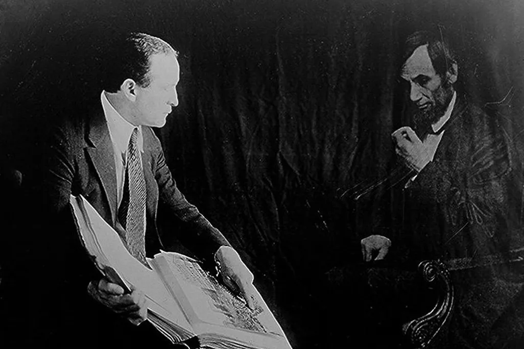 Houdini photographed with the "ghost" of Abraham Lincoln