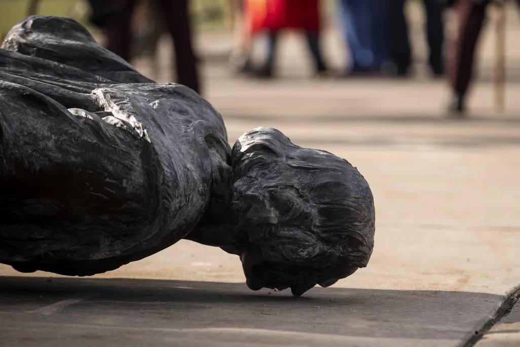 Minnesota statue of Christopher Columbus lies facedown during a protest on June 10, 2020