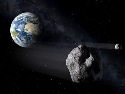 Two Massive Asteroids Will Fly Past Earth This Week. Here's What to Know image