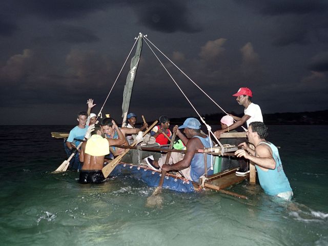 In August 1994, Cuba&#39;s leader Fidel Castro announced a reprieve in the enforcement of laws governing emigration (above: a homemade raft sets off from the coast near Havana on August 22, 1994) and as a result nearly 35,000 left the island.&nbsp;&nbsp;