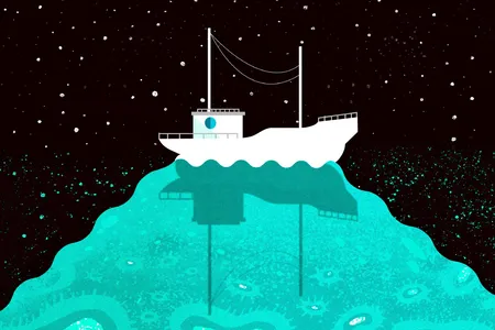 Glowing green waters surrounded a boat in the Arabian Sea.