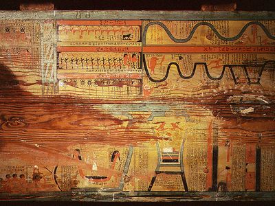 The floor of one of the coffins of Gua, a physician of the governor Djehutyhotep. The paintings, dated to 1795 B.C., show the “two ways”—land and sea—that the dead could use to navigate the afterlife. An even older “Book of Two Ways” has now been unearthed.