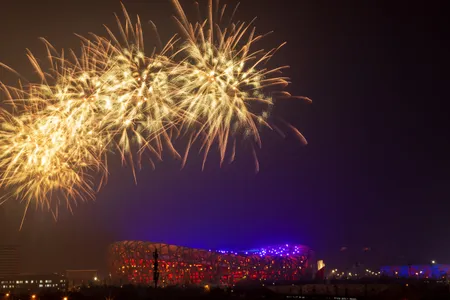 Fireworks fill the sky over the &quot;Bird&#39;s Nest&quot; arena in Beijing on January 30, 2022