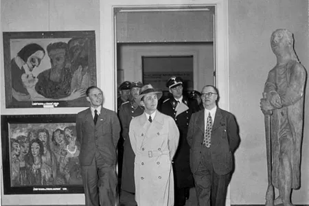 Joseph Goebbels viewing the 1937 Degenerate Art Exhibition.