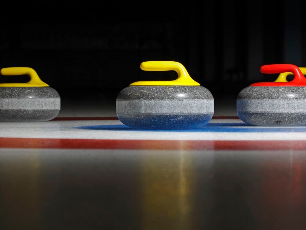 Why does a curling stone curl?
