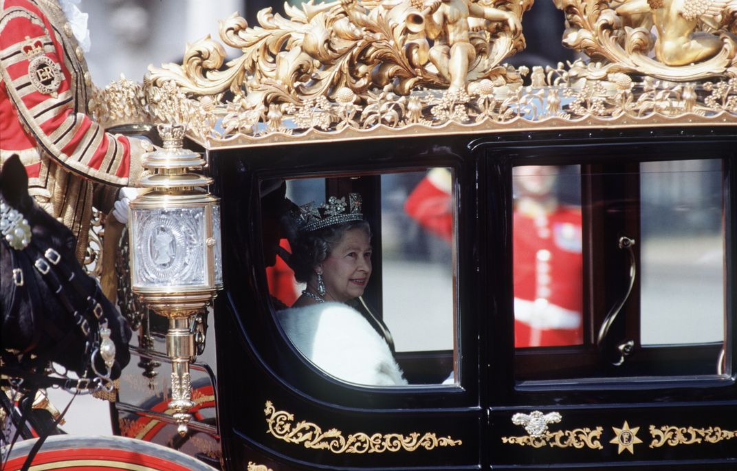 The queen and Prince Philip in a carriage during the procession to the state opening of the U.K. Parliament on May 6, 1992