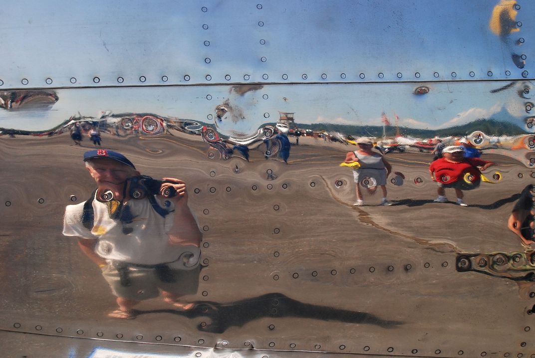 Reflected in the side of a B25 at the Arlington, WA., Airshow