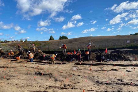 Archaeologists completing excavations on Fischer-Hallman Road