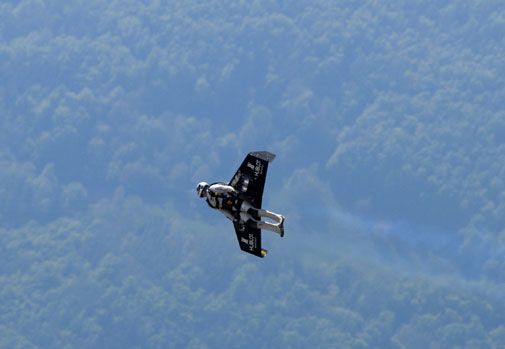 Swiss adventurer Yves Rossy crosses the English Channel in his home-built, jet-powered wing.