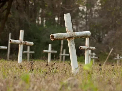Only a portion of the scores of children buried at the former Florida School for Boys were located in its graveyard. The majority of students were buried elsewhere in unmarked, undocumented graves.