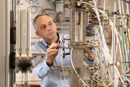 Chris Goyne inspects the test section of the Supersonic Combustion Facility at the University of Virginia in Charlottesville.