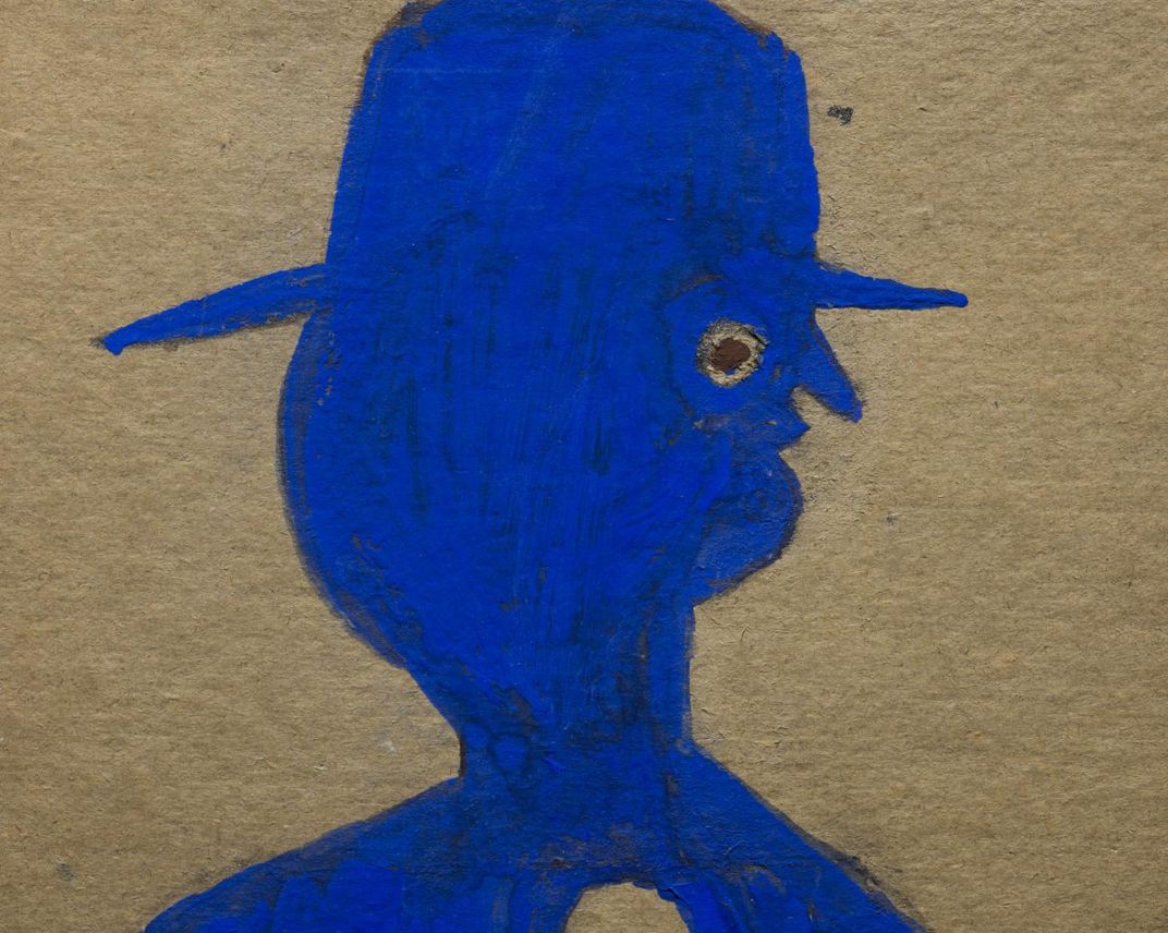 A detail of a painting of a man in blue. 