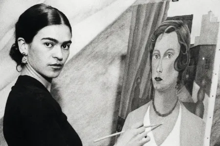 Frida Kahlo painting a portrait in 1931