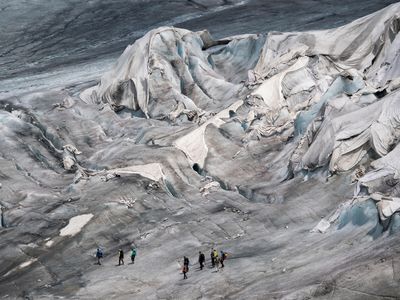 The oldest glacier in the Alps is protected by special white blankets to prevent it from melting.