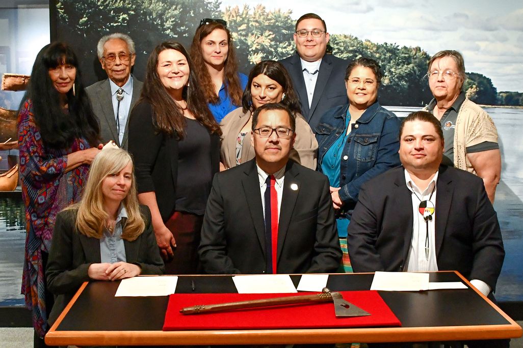 Members of the Ponca delegation pose with the repatriated pipe tomahawk