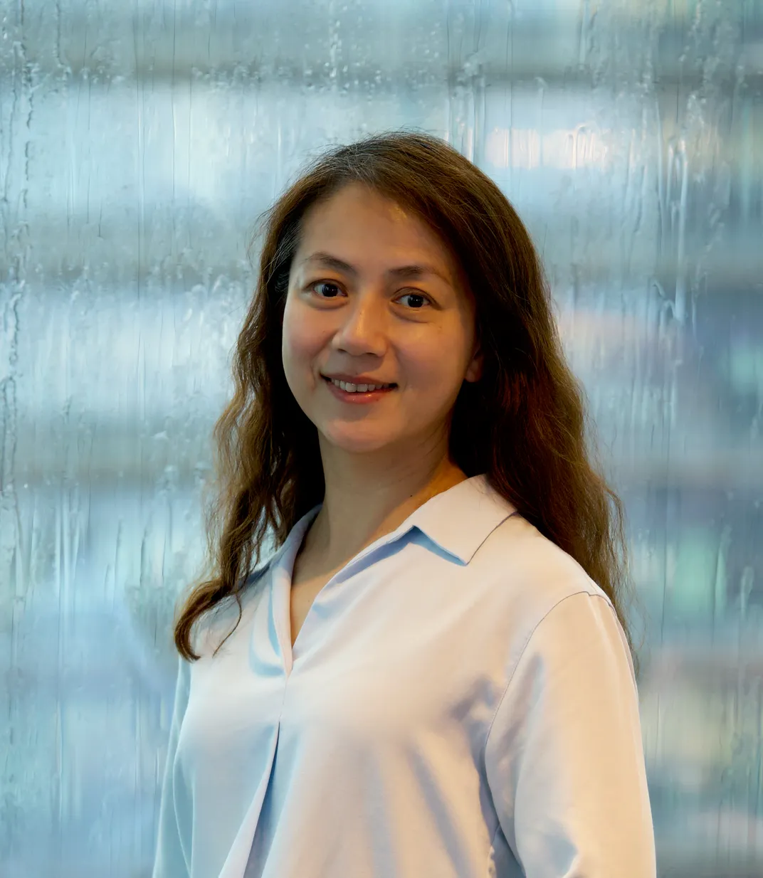 headshot of Yuhua Yu