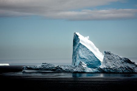 The Shape of Things to Come, Antarctic Sound, February 2010: "As we sailed with the land to our backs, I saw this bright, jagged iceberg with a dark-blue sea," writes Seaman. 