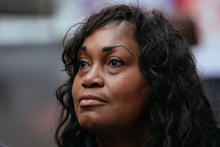 Tamara Lanier takes questions this week during a press conference announcing a lawsuit against Harvard University.