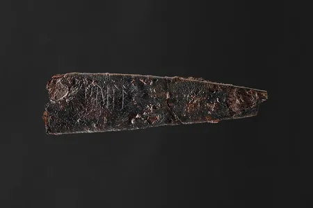 The three-inch blade is one of the earliest surviving examples of a runic inscription in Denmark.