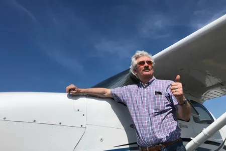 Standing by his Cessna 172S, Barry Eccleston signals success on August 22, 2019, the day he earned his instrument flight rating.