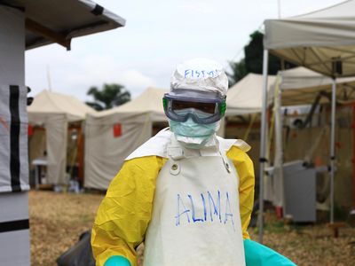 A health worker in protective gear works at an Ebola treatment centre in Beni, Eastern Congo in September 2018.
