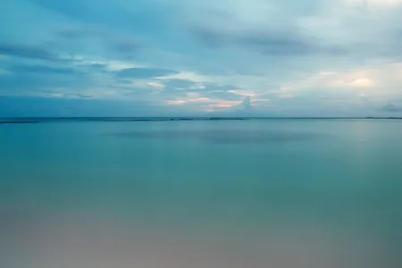 Where does the ocean end and the sky begin? It&rsquo;s a little hard to tell as the sun sets on Aruba&rsquo;s Baby Beach.