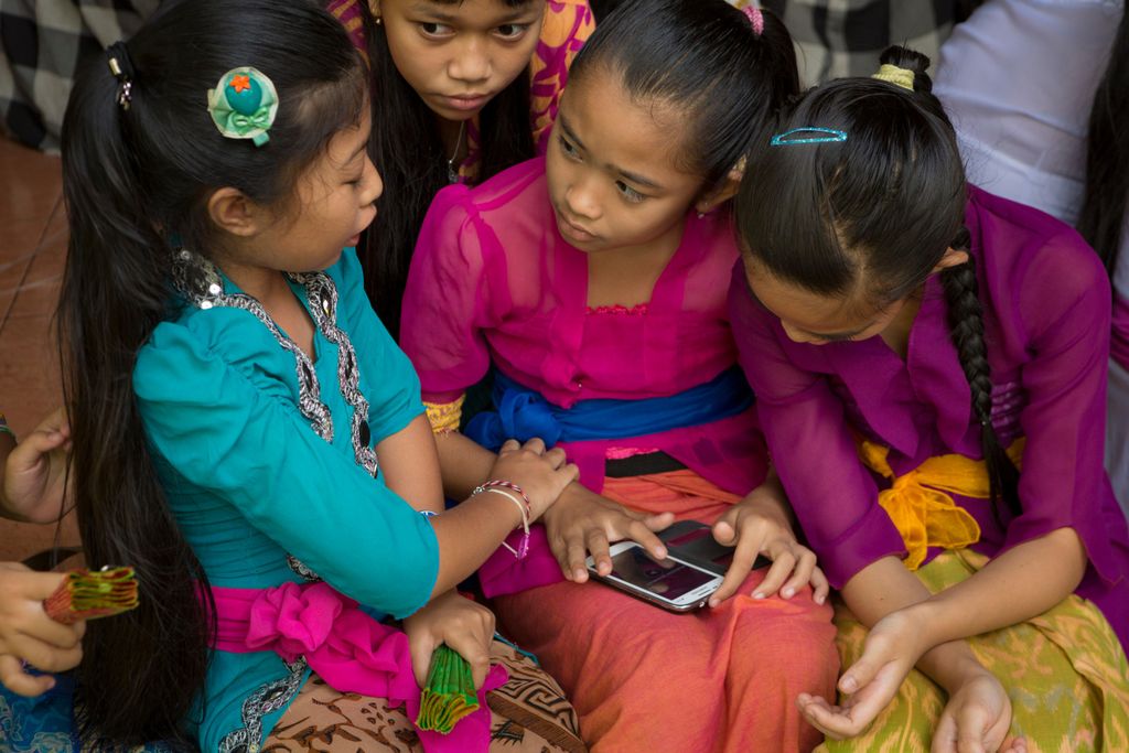 Girls Playing With Mobile Phone