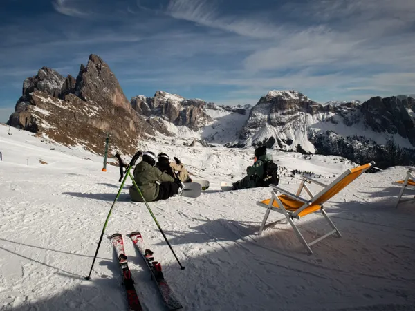 Skiers admire the view of Seceda. thumbnail