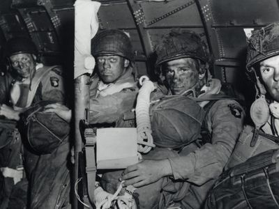 Paratroopers of the U.S. Army’s 101st Airborne Division preparing for their mission on D-Day on the evening of June 5th/6th, 1944.
