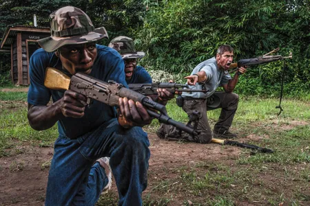 In the Democratic Republic of Congo, trainer Franck Canniet, far right, trains rangers for a confrontation with poachers.