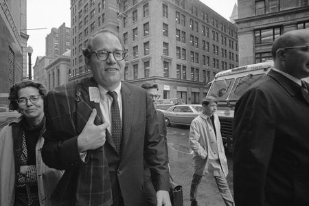 William Sloane Coffin Jr., followed by his sister, arrives at federal building in Boston on May 20, 1968.