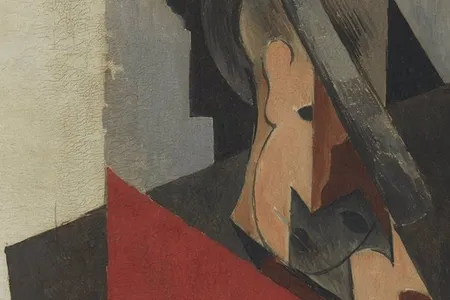 A close-up view of Picasso's Seated Man (1917) shows the deep cracks running along its surface.