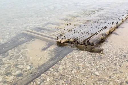 The wreckage of a mid-19th century ship washed ashore north of Ludington, Michigan, on April 24.