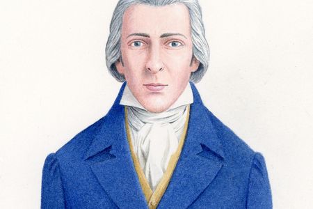 Mr. Darcy as depicted in a tailored blue Regency-styled suit.