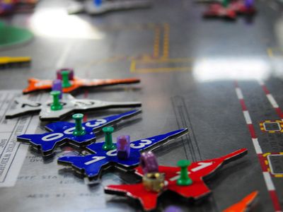 101219-N-2953W-028
PACIFIC OCEAN (Dec. 19, 2010) Sailors position aircraft markers on the Ouija board during a simulated general quarters drill aboard the aircraft carrier USS Carl Vinson (CVN 70). Carl Vinson and Carrier Air Wing (CVW) 17 are on a three-week composite training unit exercise followed by a deployment to the U.S. 7th and 5th Fleet areas of responsibility. (U.S. Navy photo by Mass Communication Specialist 2nd Class Adrian T. White/Released)