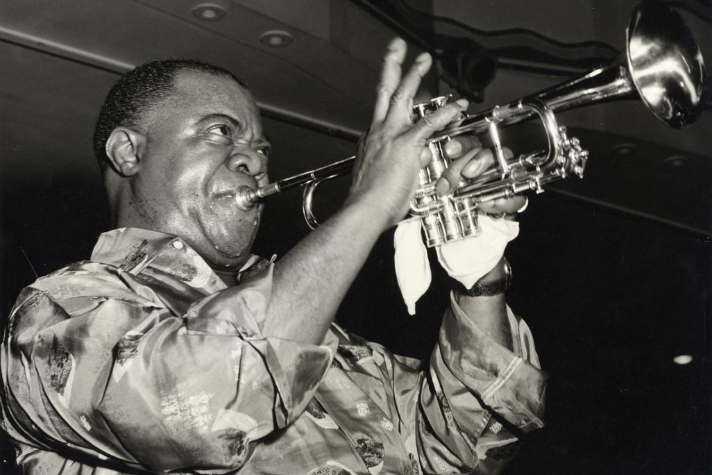 Louis Armstrong playing his trumpet
