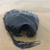 A Jet-Black, Bioluminescent 'Football Fish' Washed Up on a California Beach icon